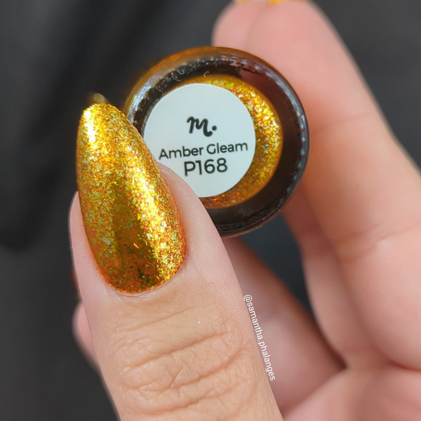 Maniology - Stamping Nail Polish - Rustic Charm: Amber Gleam (P168) - Orange with Silver Glitter Jellies